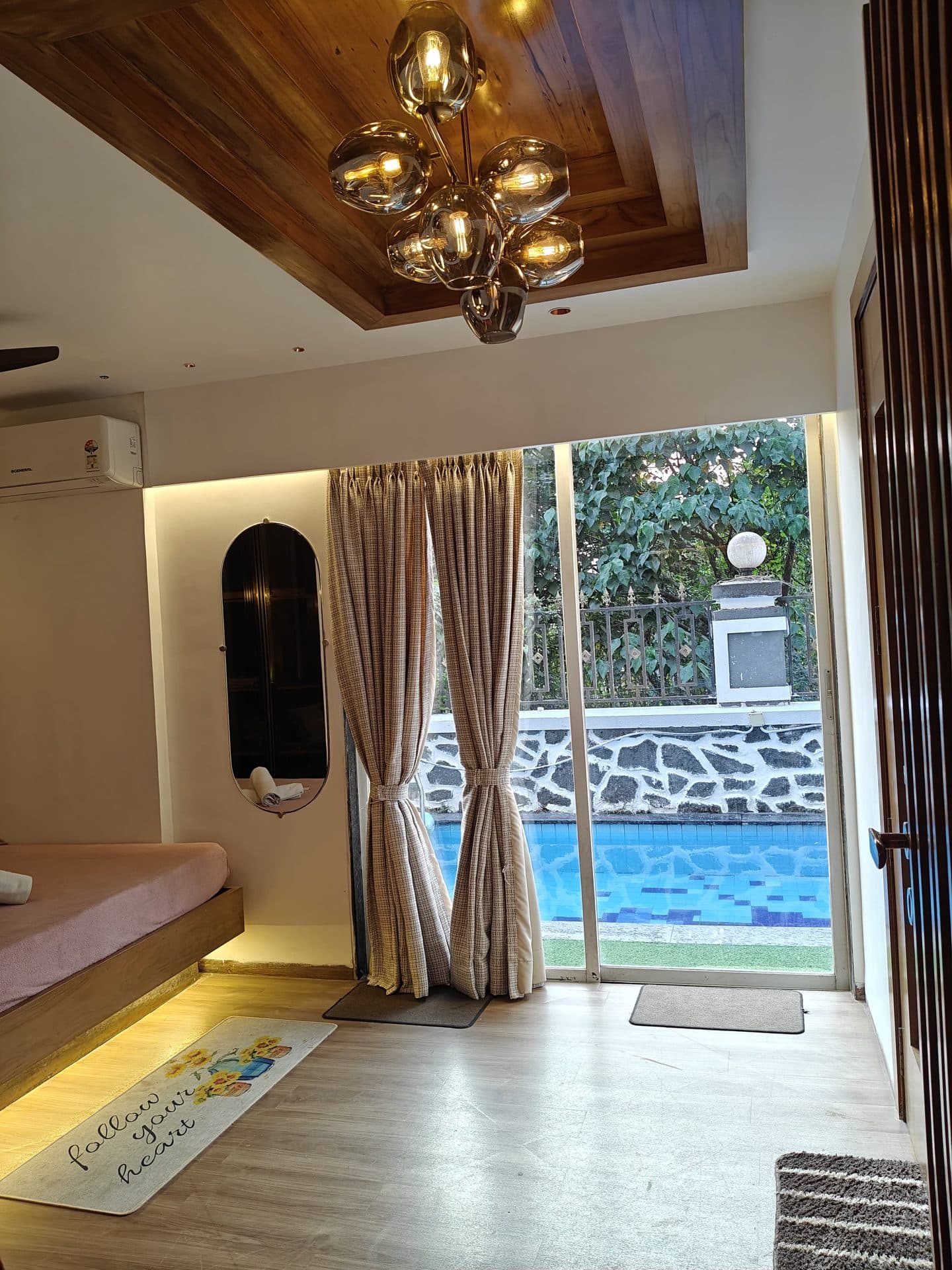Bedroom opening onto the pool deck