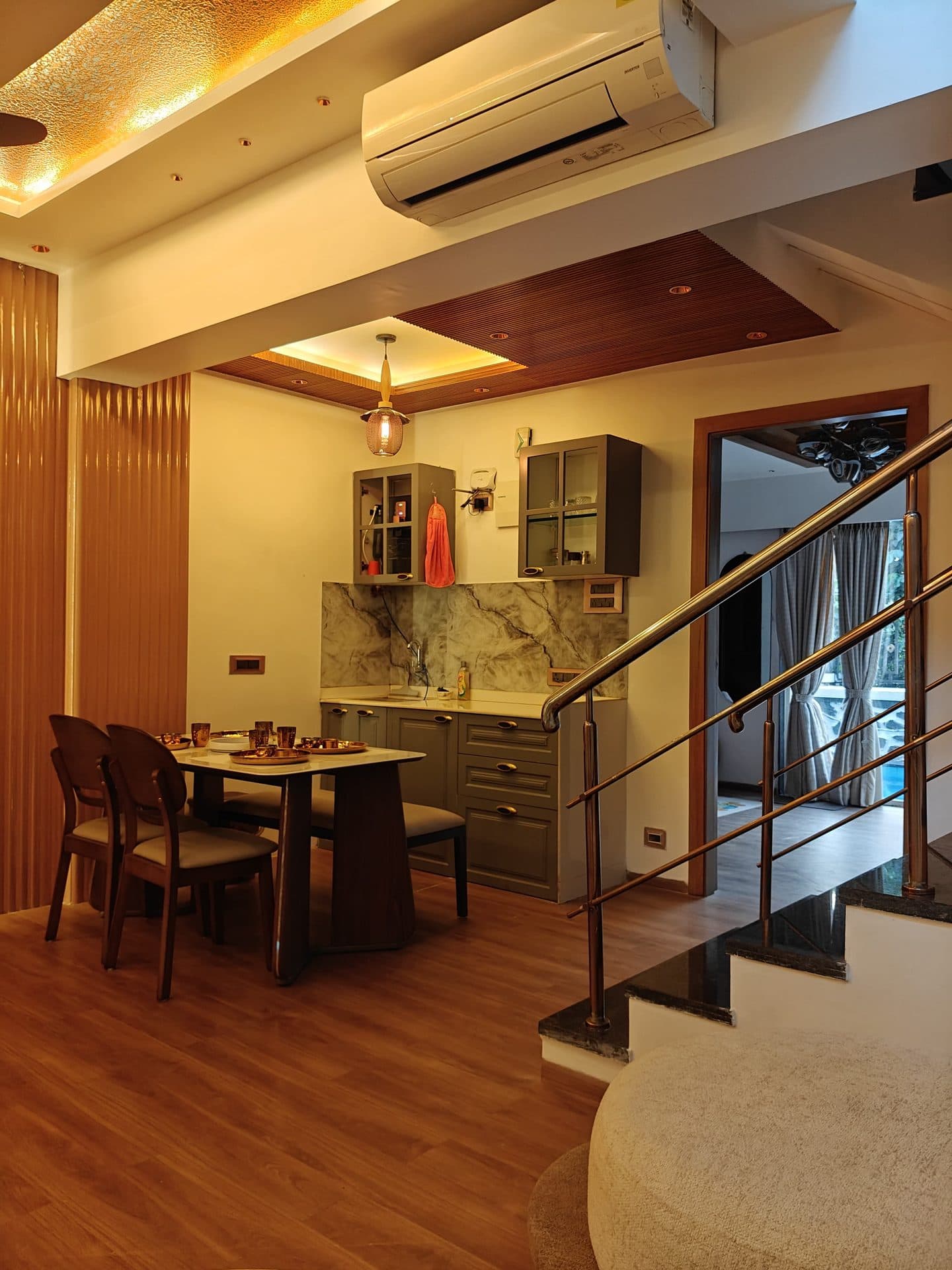 Kitchen and dining nook by the staircase
