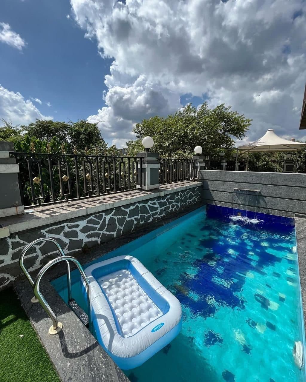 Private pool with poolside float