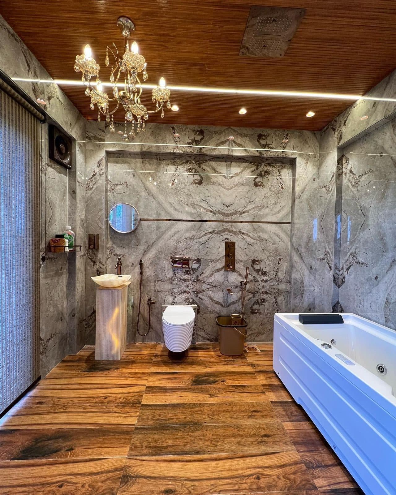 Rustic marble bathroom with freestanding tub